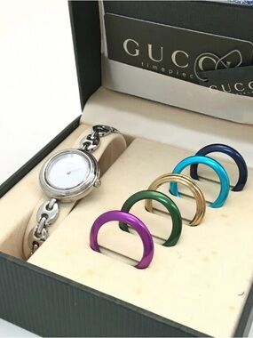 Gucci Silver Women's Bracelet Watch with Interchangeable Colorful Bezels